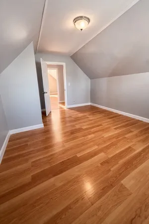 a kitchen with stainless steel appliances granite countertop a sink a stove top oven a counter space and cabinets