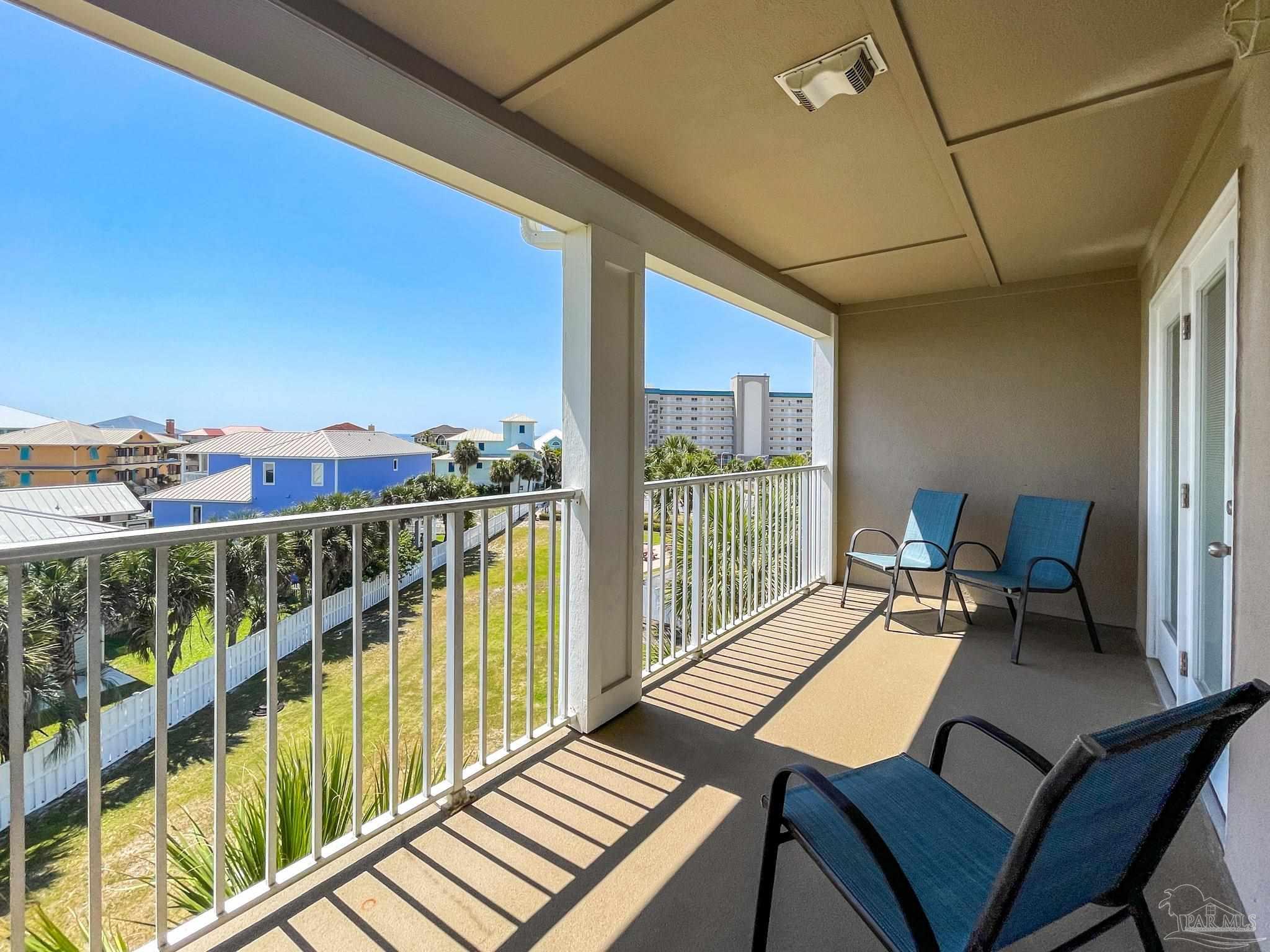 13351 Johnson Beach Road, Unit 402E Pensacola, FL 32507 - Photo 29 of 30 a view of balcony with couch