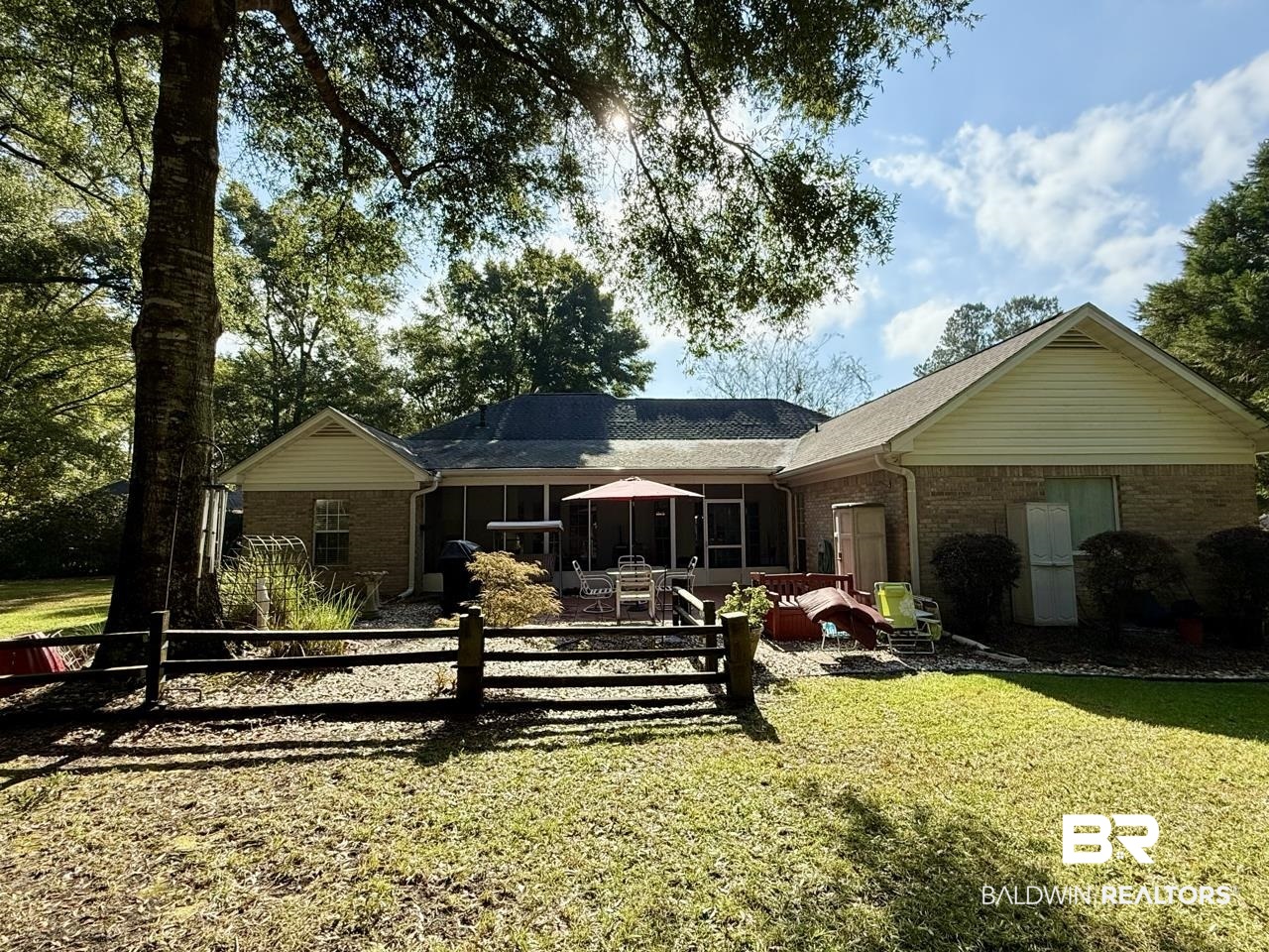 8091 Majors Court Daphne, AL 36526 - Photo 32 of 35 Rear view of property featuring a lawn, partio, and screened porch