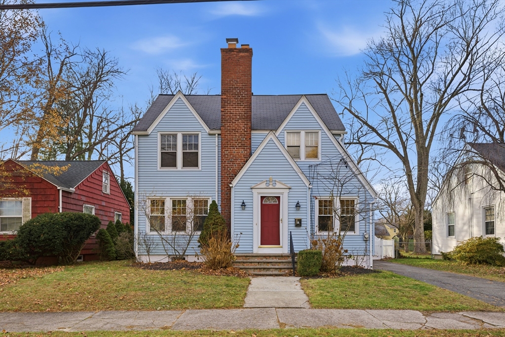 36 Garland Street Springfield, MA 01118 - Photo 1 of 42 a front view of a house with a yard