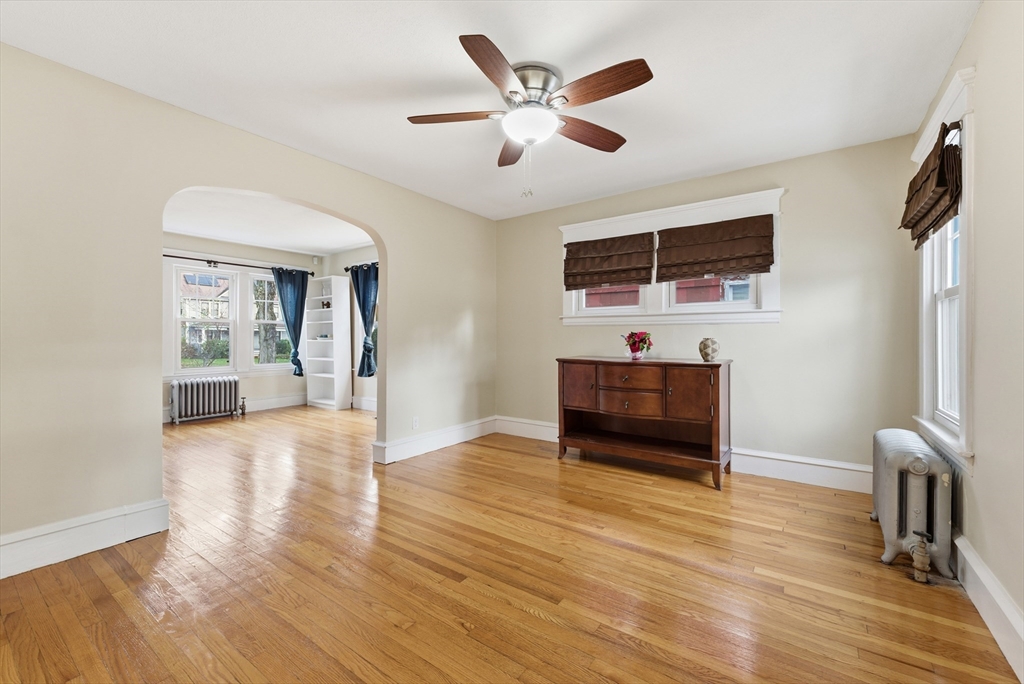 36 Garland Street Springfield, MA 01118 - Photo 17 of 42 a living room with furniture and a flat screen tv