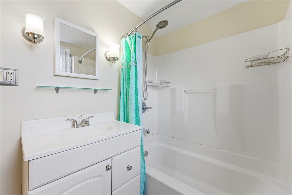 36 Garland Street Springfield, MA 01118 - Photo 22 of 42 a bathroom with a sink toilet and shower