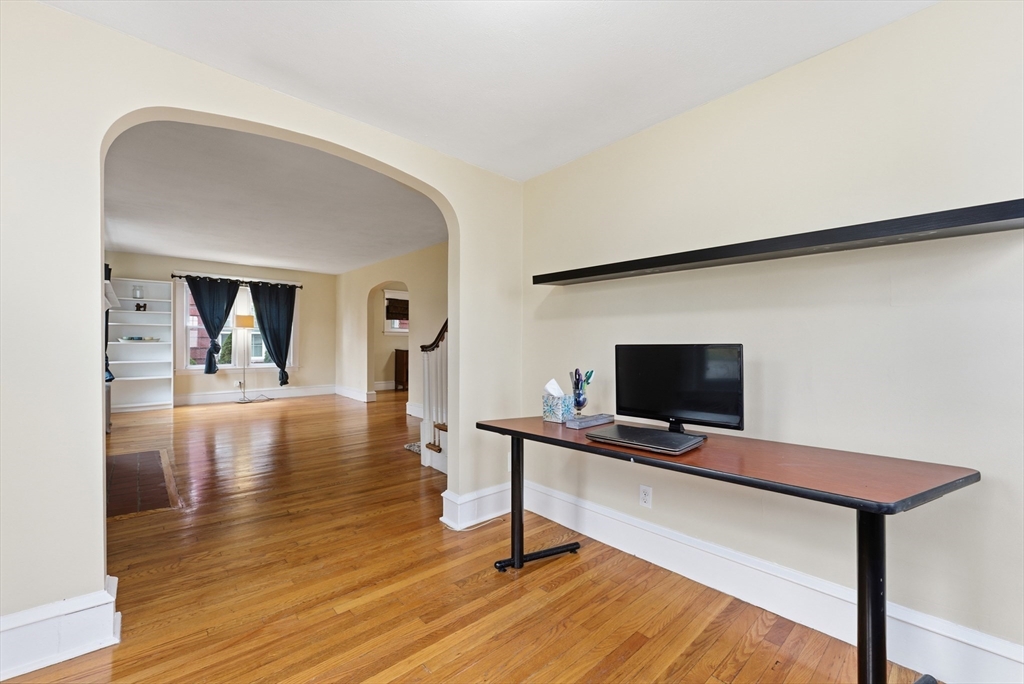 36 Garland Street Springfield, MA 01118 - Photo 10 of 42 a view of a livingroom with furniture and wooden floor