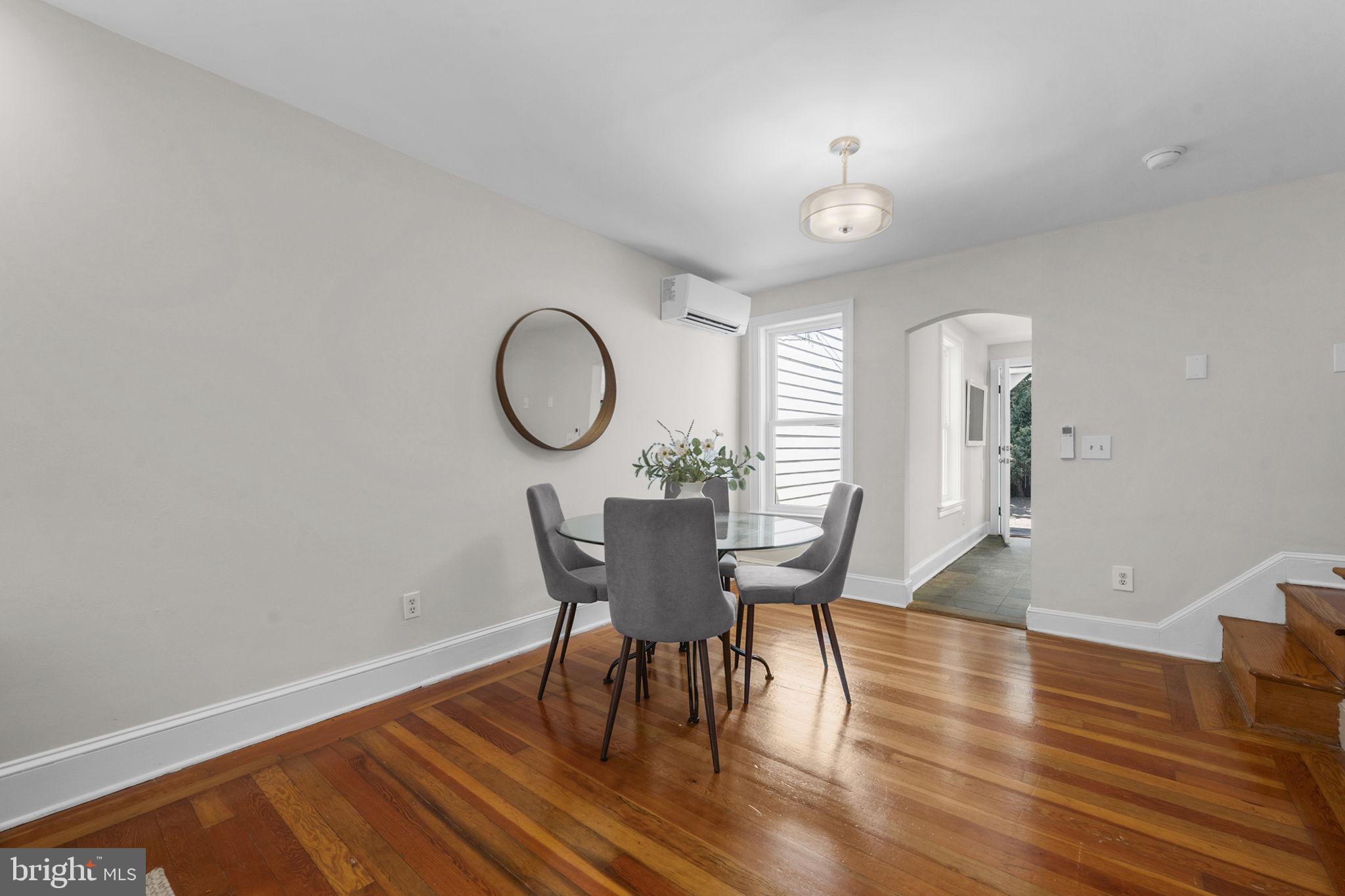 914 15th Street Southeast Washington, DC 20003 - Photo 7 of 37 a view of a dining room with furniture and wooden floor