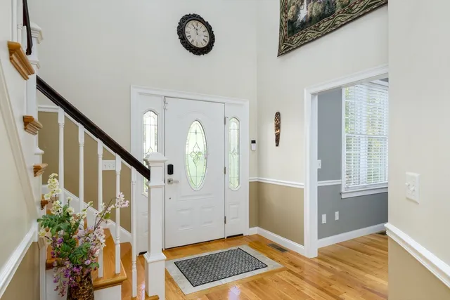 a view of entryway with wooden floor