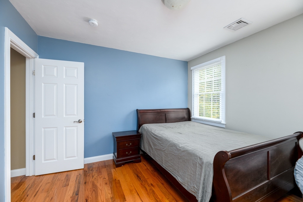 40 Rustic Drive Worcester, MA 01609 - Photo 24 of 37 a bedroom with a bed and wooden floor