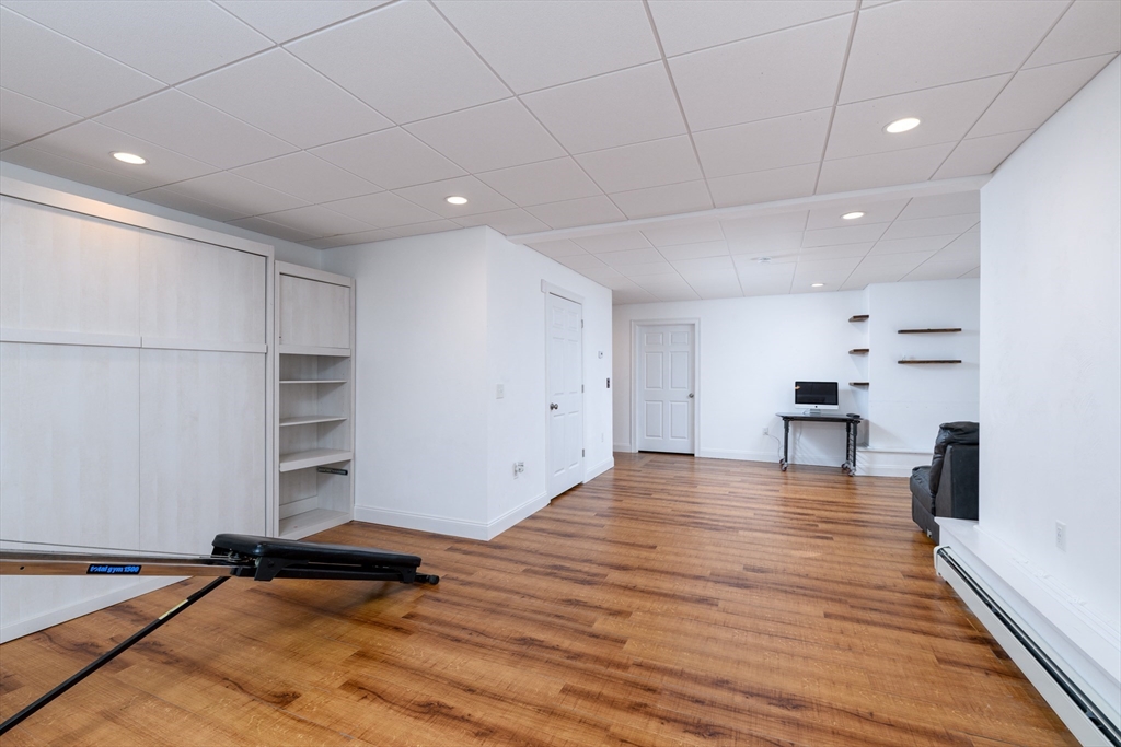 40 Rustic Drive Worcester, MA 01609 - Photo 26 of 37 a view of kitchen with cabinets and wooden floor