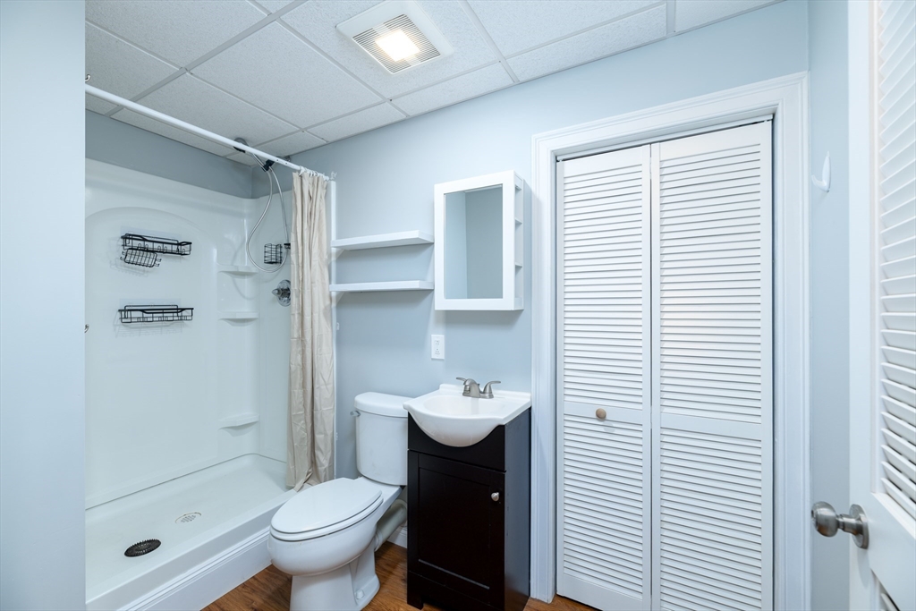 40 Rustic Drive Worcester, MA 01609 - Photo 28 of 37 a bathroom with a sink toilet and shower
