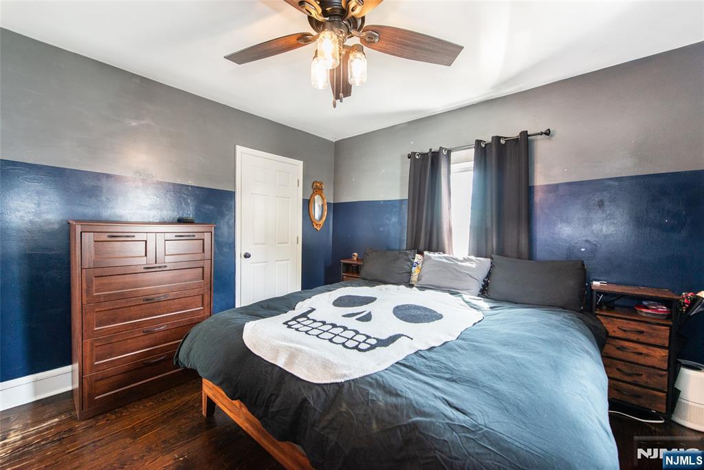 405 Washington Street Boonton, NJ 07005 - Photo 17 of 24 a bed sitting in a room next to a window