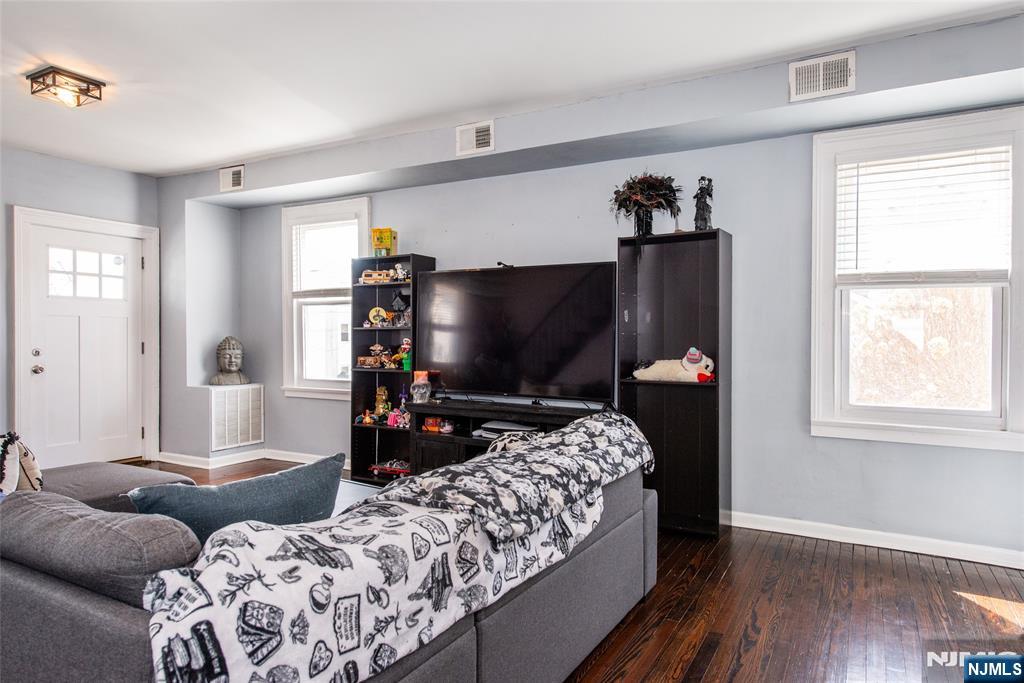405 Washington Street Boonton, NJ 07005 - Photo 6 of 24 a living room with furniture and a flat screen tv