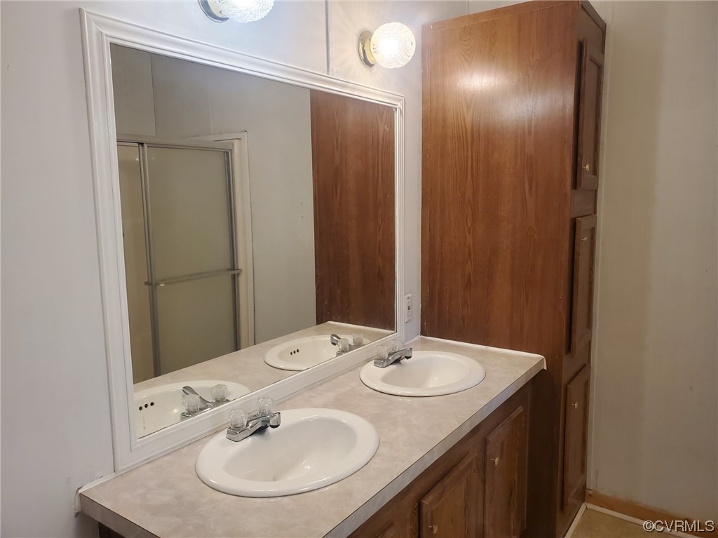 2675 Scuffletown Road Rice, VA 23966 - Photo 11 of 29 a bathroom with a sink and a mirror