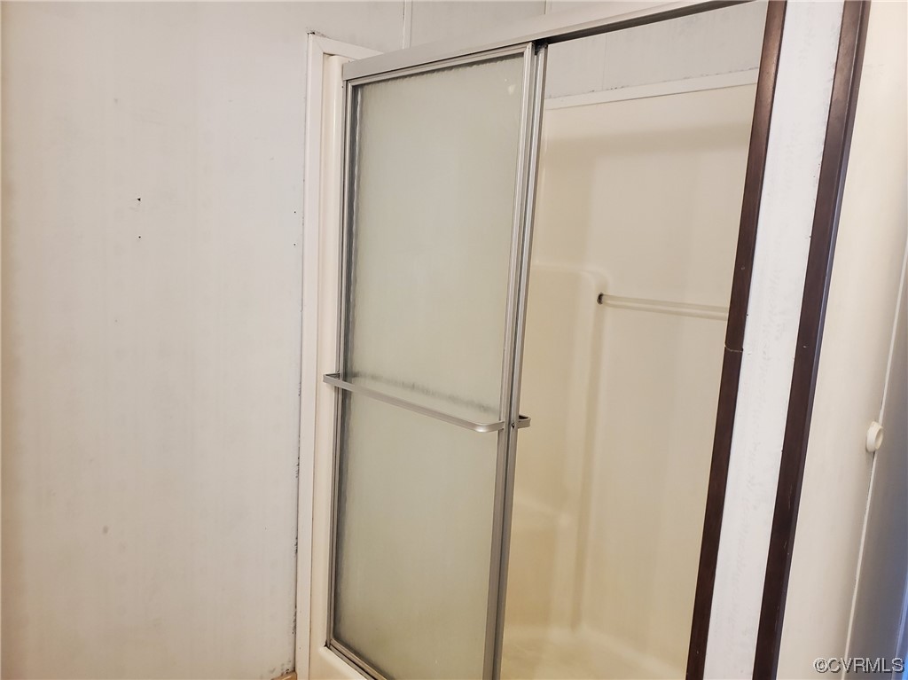 2675 Scuffletown Road Rice, VA 23966 - Photo 12 of 29 a bathroom with a glass shower door