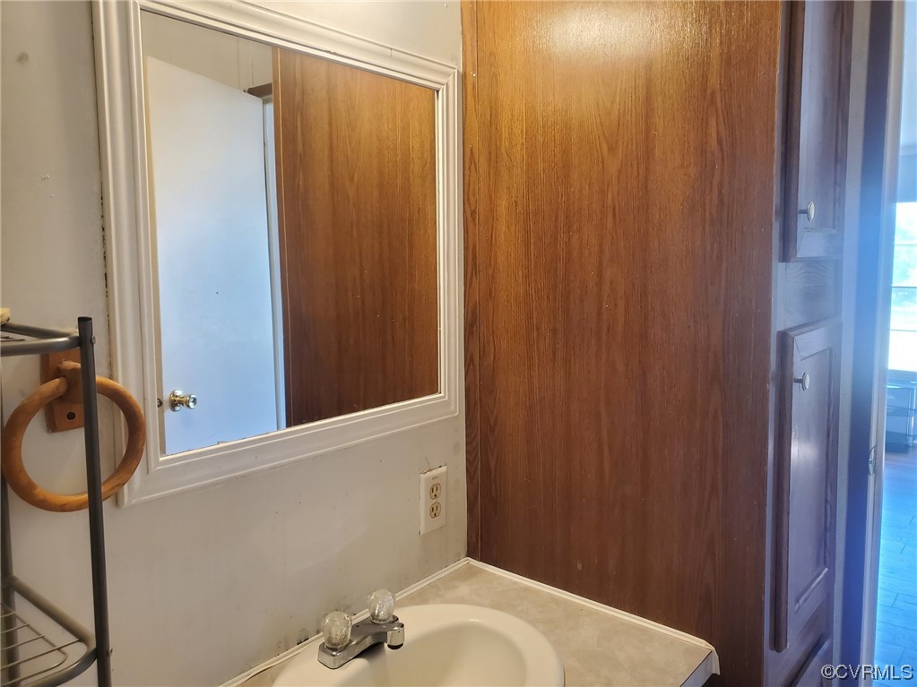 2675 Scuffletown Road Rice, VA 23966 - Photo 16 of 29 a bathroom with a sink and a mirror
