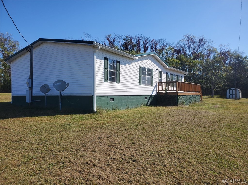 2675 Scuffletown Road Rice, VA 23966 - Photo 25 of 29 a front view of a house with a yard and garage