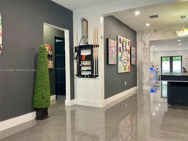 view of a hallway with dining area