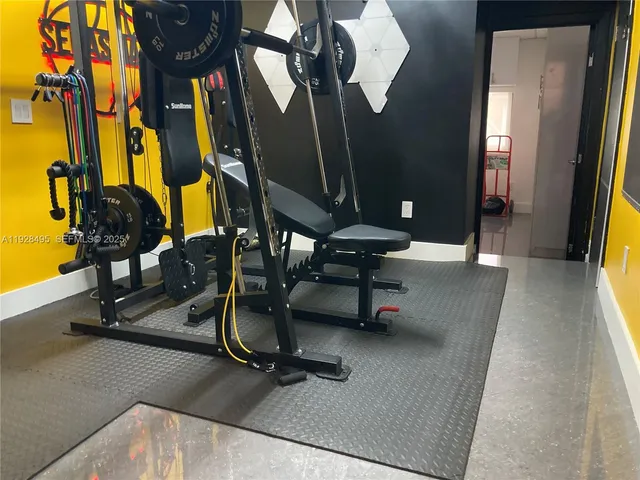 a view of a room with gym equipment