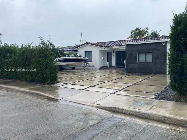 a house with yard in front of it