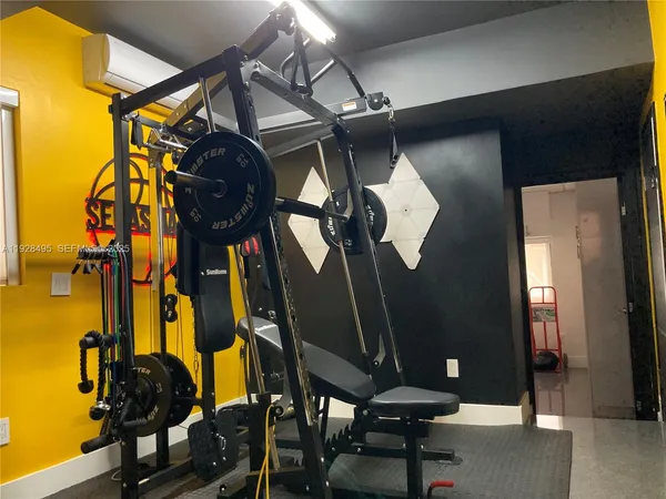 a view of a room with gym equipment