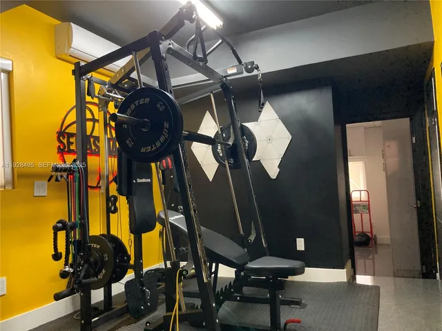 a view of a room with gym equipment