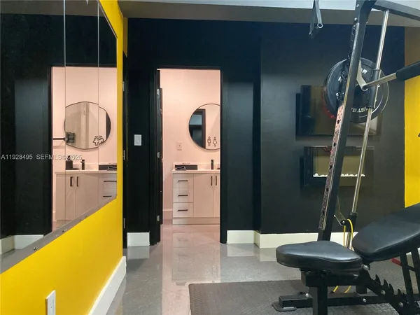 a bathroom with a bathtub and a sink