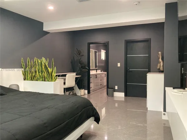 a picture of a room with shelves