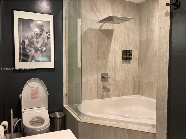 a view of an chairs and table in the patio