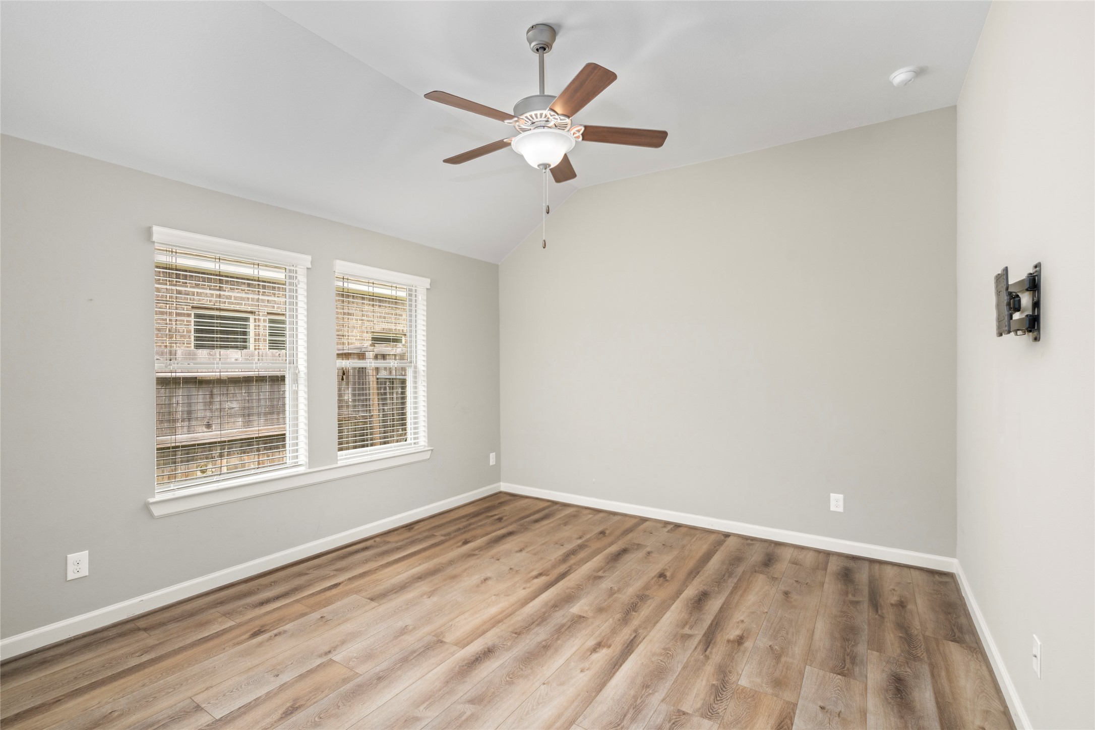 143 Castlegate Lane Houston, TX 77065 - Photo 24 of 33 Bedroom 3 with engineered hardwoods (2022). No carpet in the house