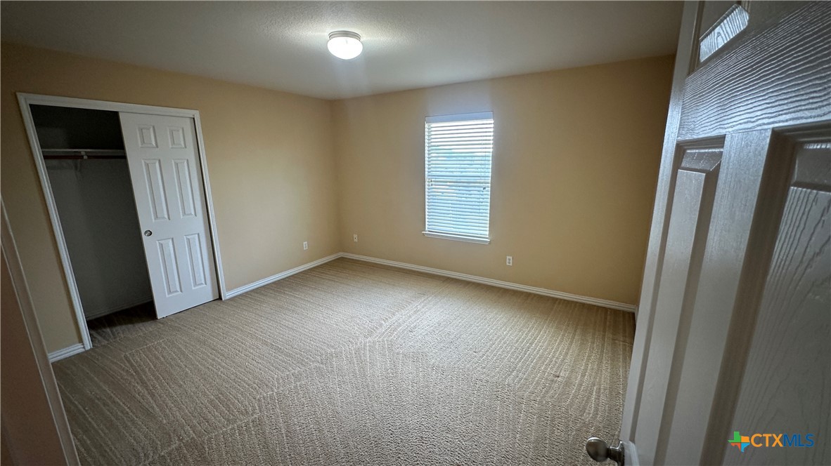 834 Red Fern Drive Harker Heights, TX 76548 - Photo 6 of 16 an empty room with windows