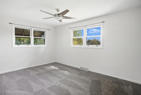 a bathroom with a sink toilet and vanity