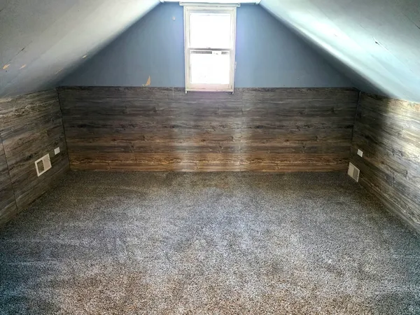 a view of a kitchen with a sink and a stove top oven
