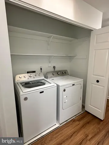 a utility room with washer and dryer