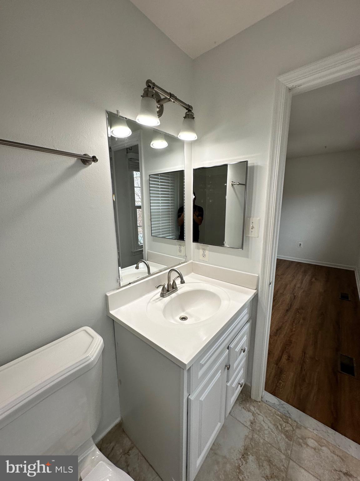 2258 Cartbridge Road Falls Church, VA 22043 - Photo 19 of 35 a bathroom with a sink and a mirror