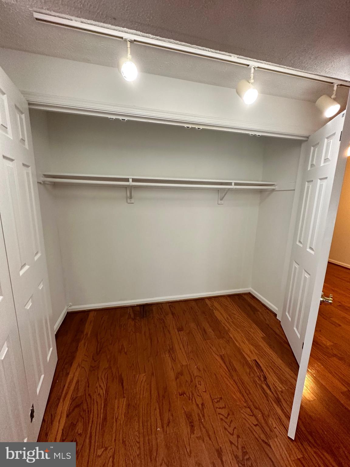 2258 Cartbridge Road Falls Church, VA 22043 - Photo 27 of 35 a view of a room with wooden floors and led lights