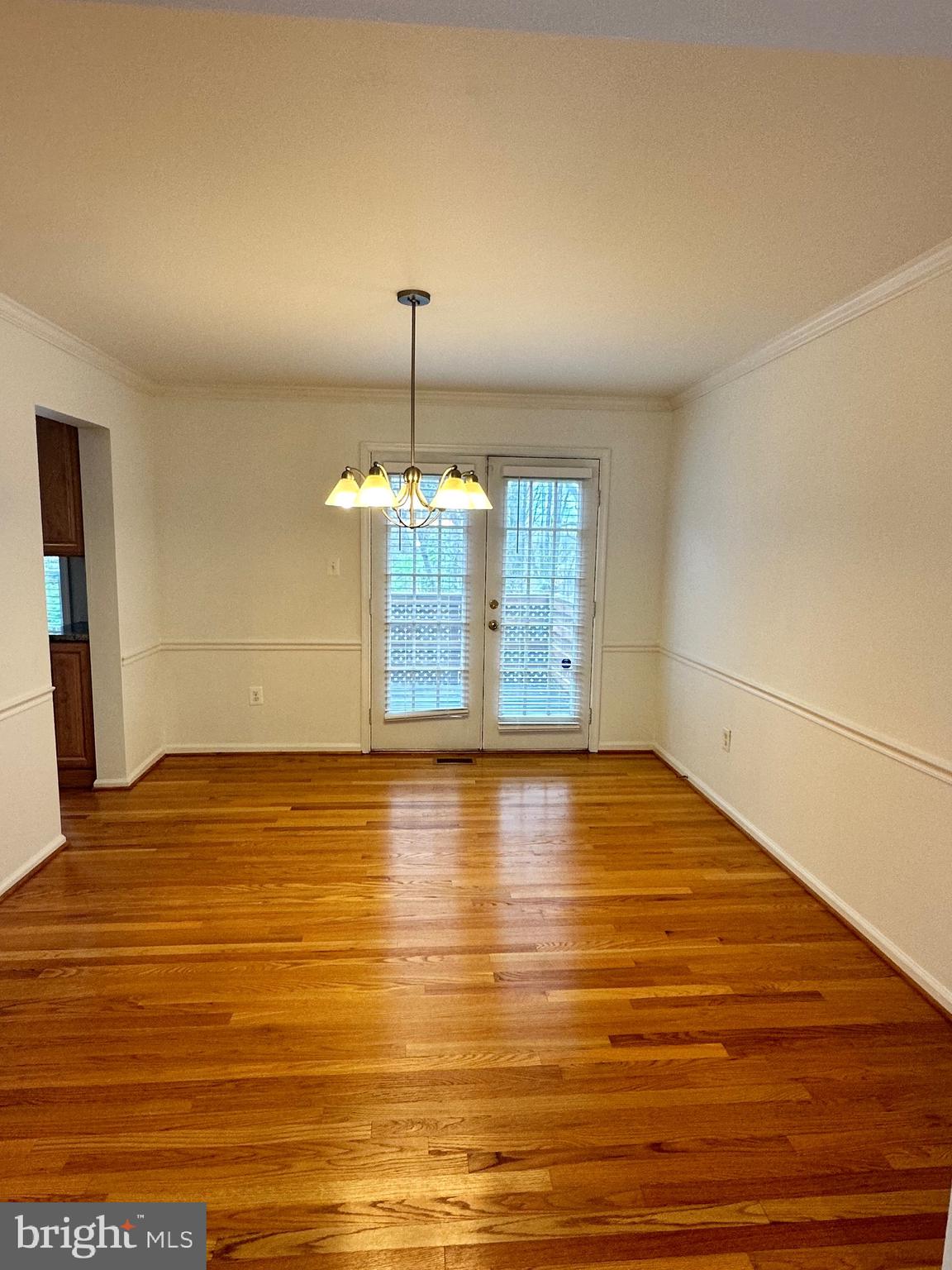 2258 Cartbridge Road Falls Church, VA 22043 - Photo 5 of 35 a view of empty room with wooden floor