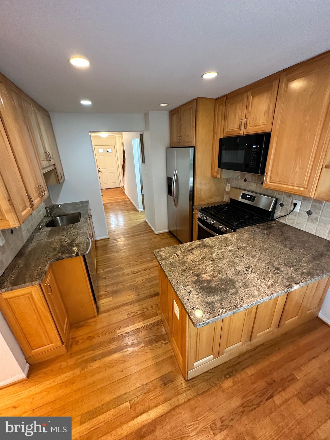 2258 Cartbridge Road Falls Church, VA 22043 - Photo 8 of 35 a view of kitchen with wooden floor
