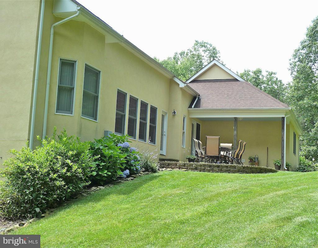 7035 Olinger Road Marshall, VA 20115 - Photo 3 of 25 a front view of a house with a yard