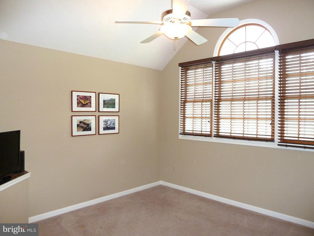 7035 Olinger Road Marshall, VA 20115 - Photo 22 of 25 a view of a livingroom with a ceiling fan and window