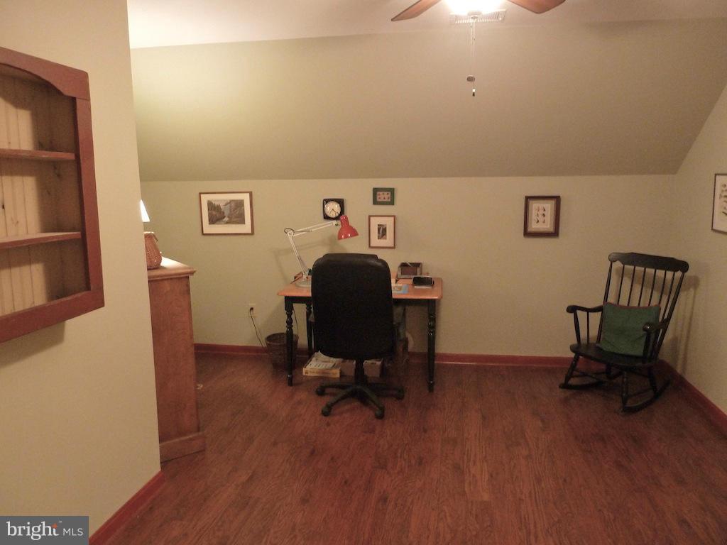 7035 Olinger Road Marshall, VA 20115 - Photo 23 of 25 a view of a workspace with furniture and a chair