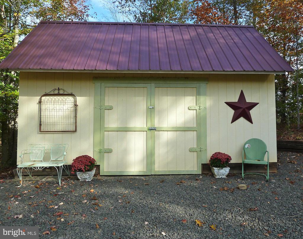 7035 Olinger Road Marshall, VA 20115 - Photo 25 of 25 a view of a backyard with wooden fence