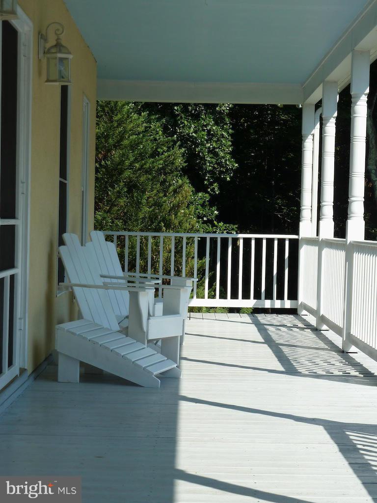 7035 Olinger Road Marshall, VA 20115 - Photo 4 of 25 a view of roof deck with furniture and garden