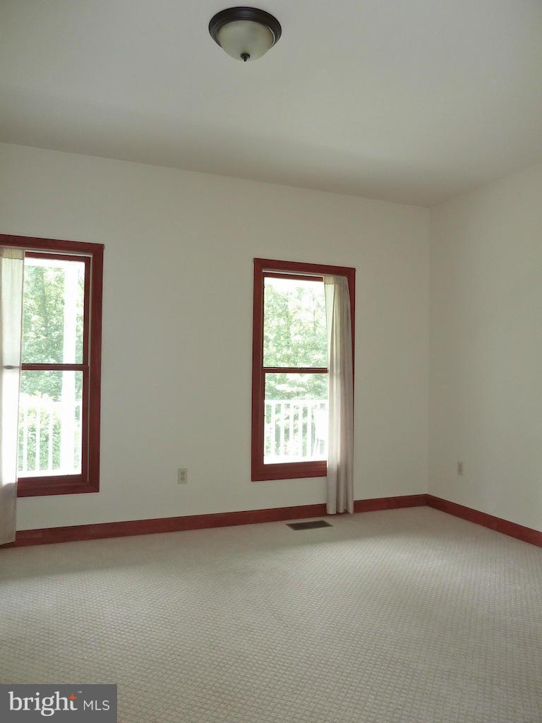 7035 Olinger Road Marshall, VA 20115 - Photo 10 of 25 an empty room with a window