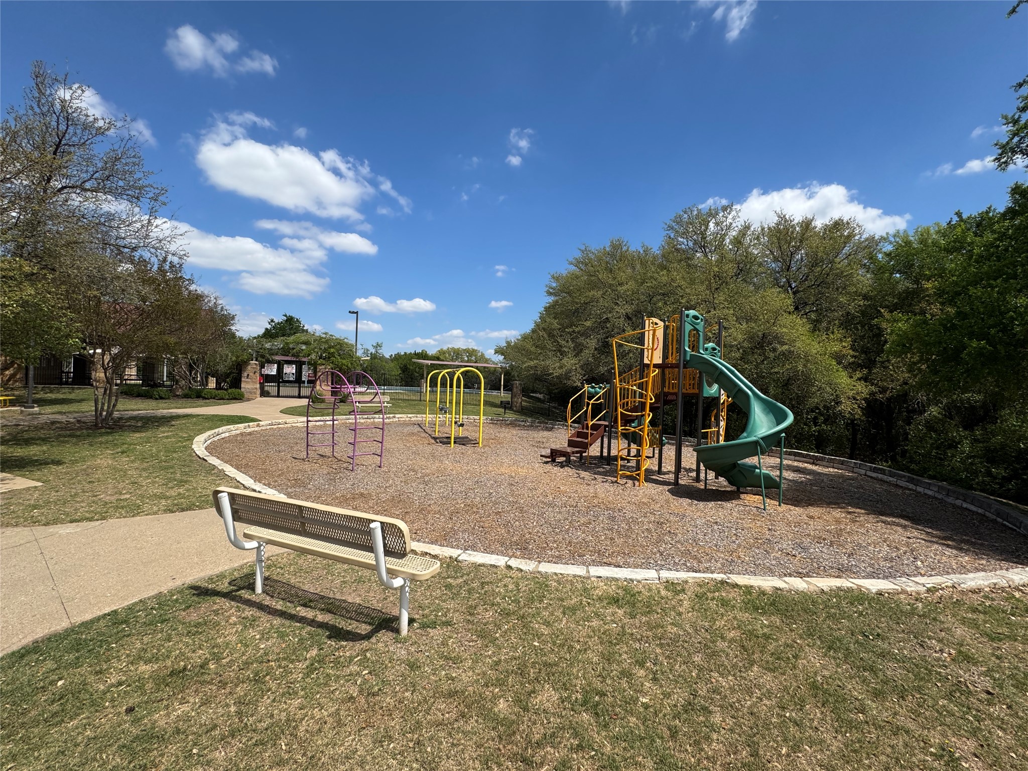 112 Eagle Owl Loop Leander, TX 78641 - Photo 29 of 34 The community playground is only a few blocks away from 112 Eagle Owl Loop.