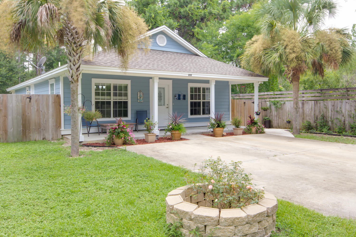 289 South 2nd Street Santa Rosa Beach, FL 32459 - Photo 2 of 22 a view of a house with backyard porch and sitting area