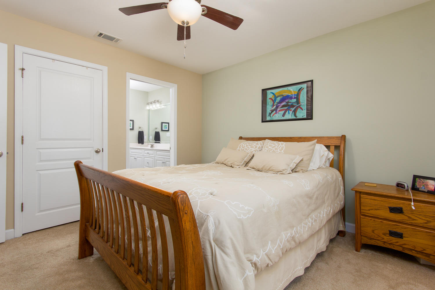 289 South 2nd Street Santa Rosa Beach, FL 32459 - Photo 11 of 22 a bedroom with a bed and a chandelier