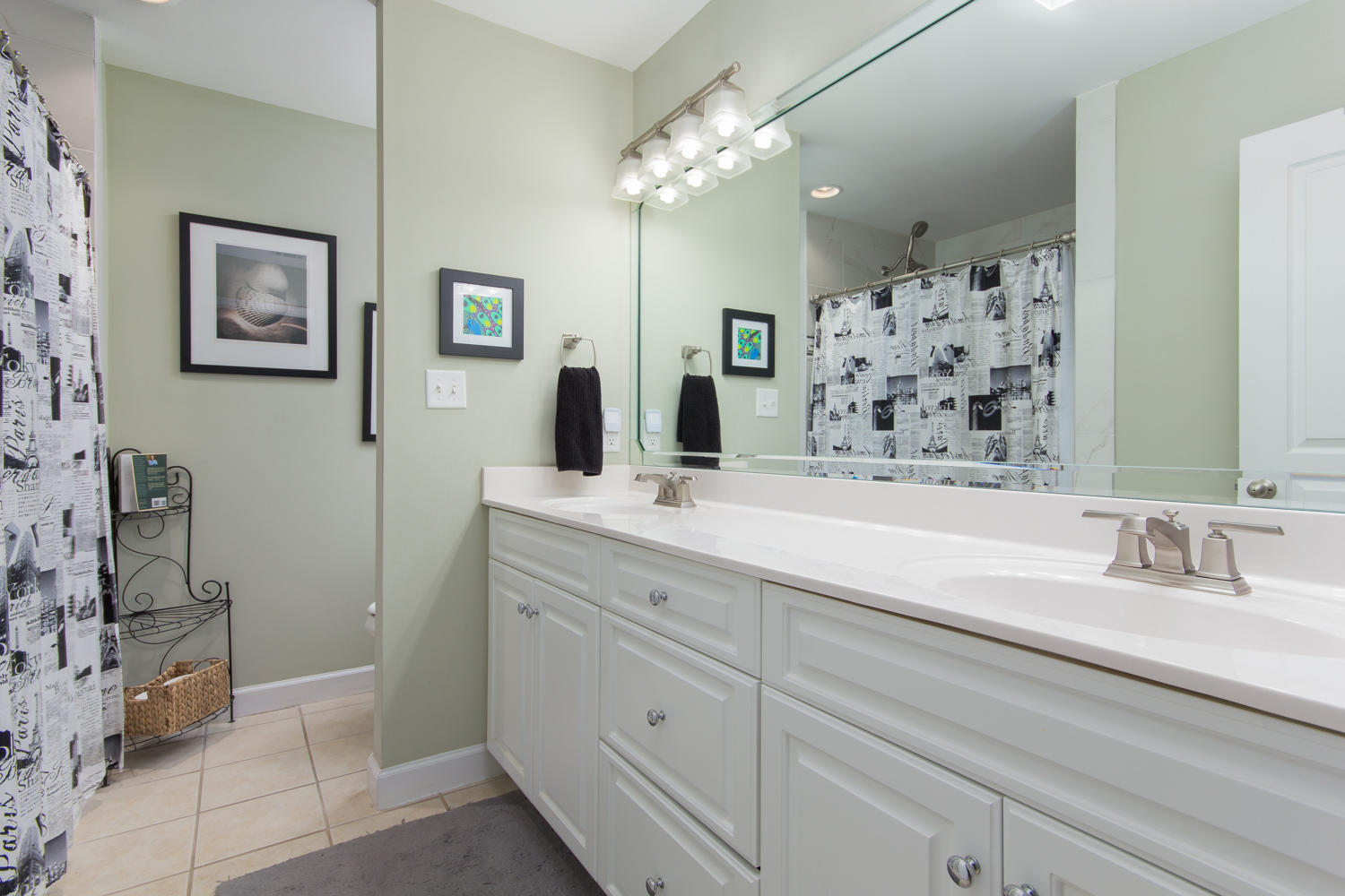 289 South 2nd Street Santa Rosa Beach, FL 32459 - Photo 13 of 22 a bathroom with a double vanity sink mirror and shower