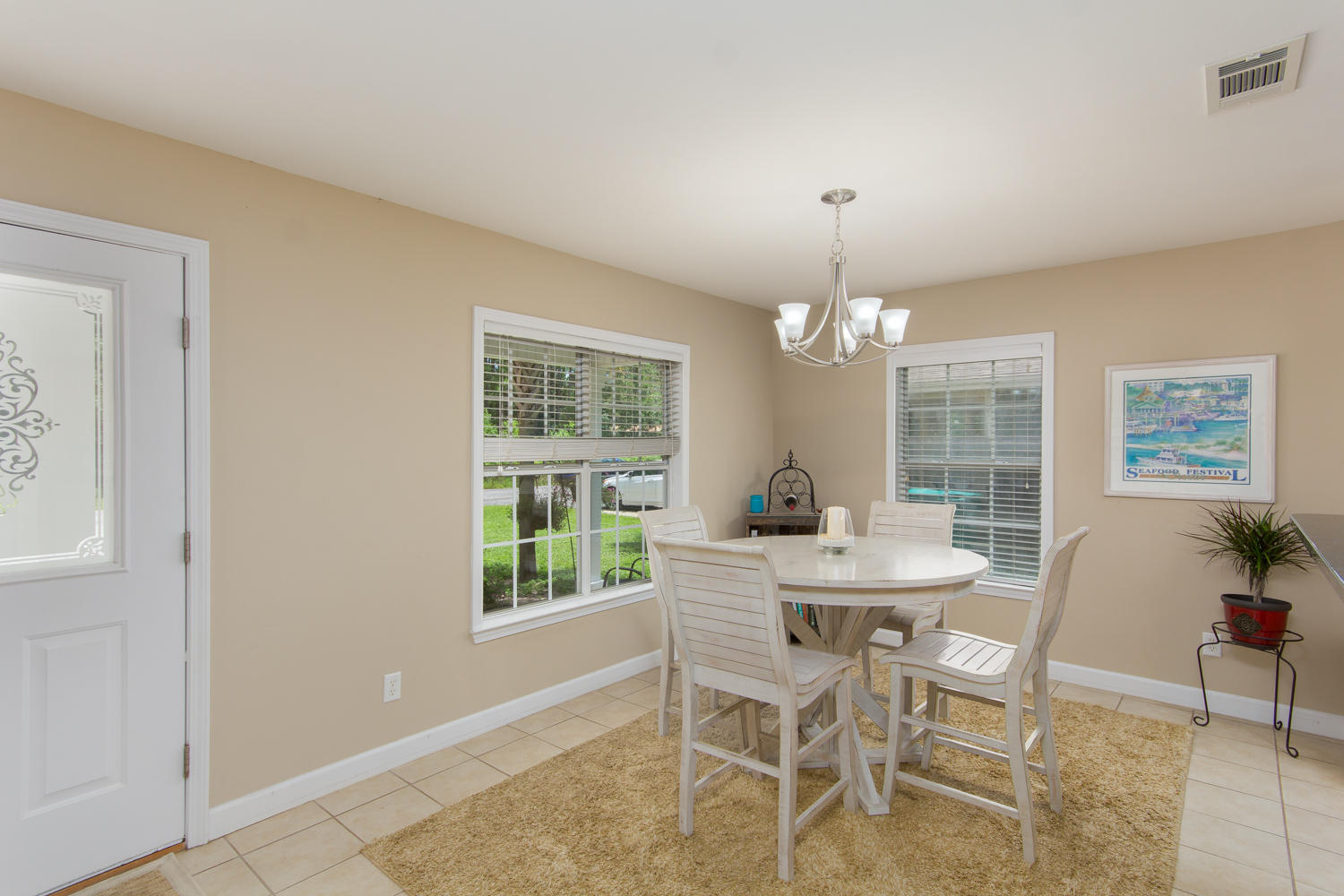 289 South 2nd Street Santa Rosa Beach, FL 32459 - Photo 6 of 22 a view of a dining room with furniture window and outside view