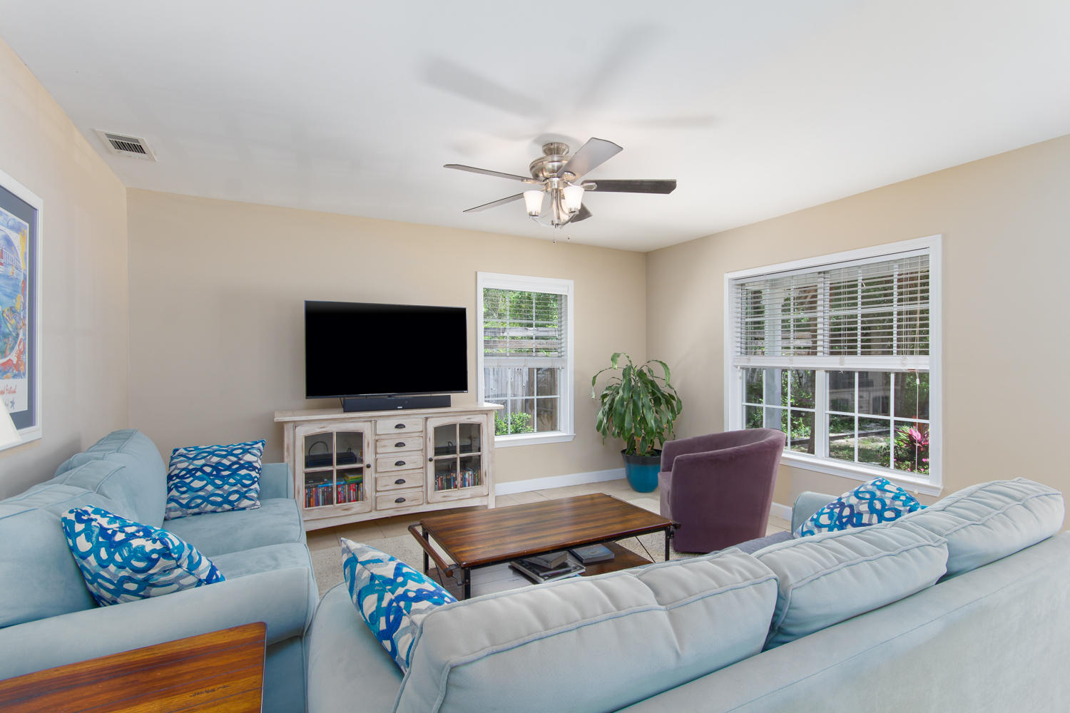 289 South 2nd Street Santa Rosa Beach, FL 32459 - Photo 8 of 22 a living room with furniture and a flat screen tv