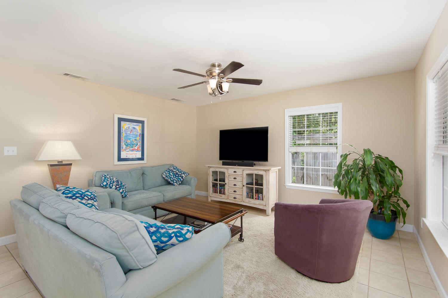 289 South 2nd Street Santa Rosa Beach, FL 32459 - Photo 10 of 22 a living room with furniture and a flat screen tv
