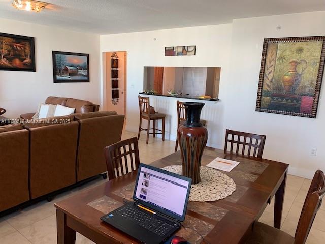 31 Southeast 5th Street, Unit 2601 Miami, FL 33131 - Photo 12 of 41 a living room with furniture and wooden floor