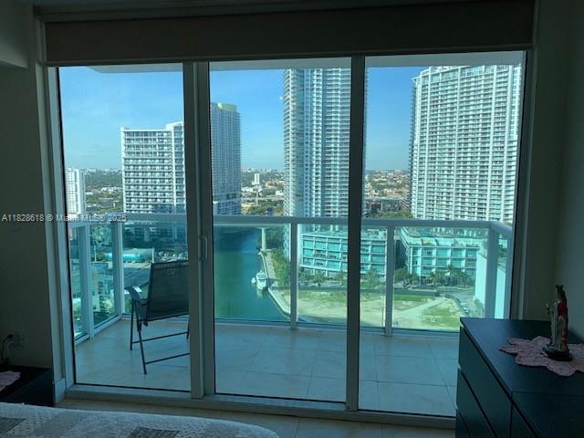 31 Southeast 5th Street, Unit 2601 Miami, FL 33131 - Photo 16 of 41 a view of a room that has a glass door